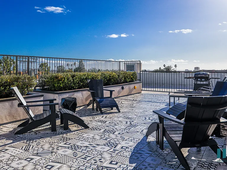 Rooftop Terrace with Seating Area and Grill