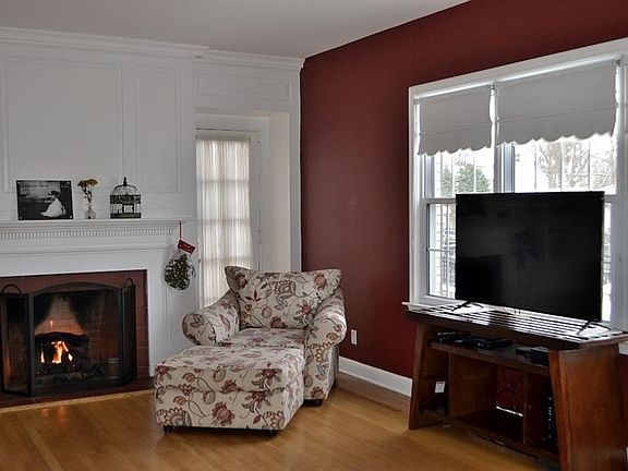 LIVING ROOM.  There are an abundance of windows in this home, allowing for wonderful natural light to fill every room!.