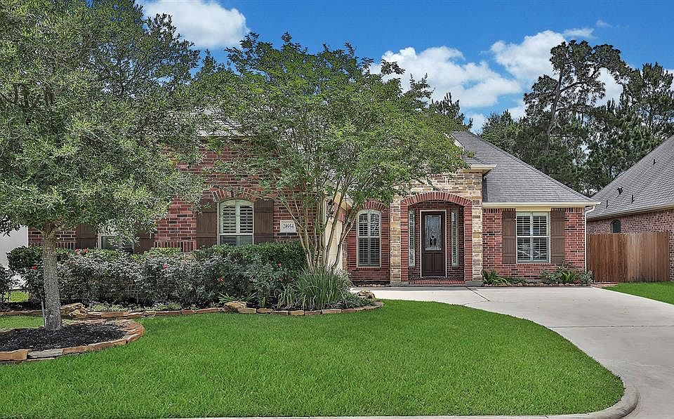 Welcome home. Gorgeous one-story with excellent curb appeal. Charming exterior is wrapped in brick and stone and accented with s