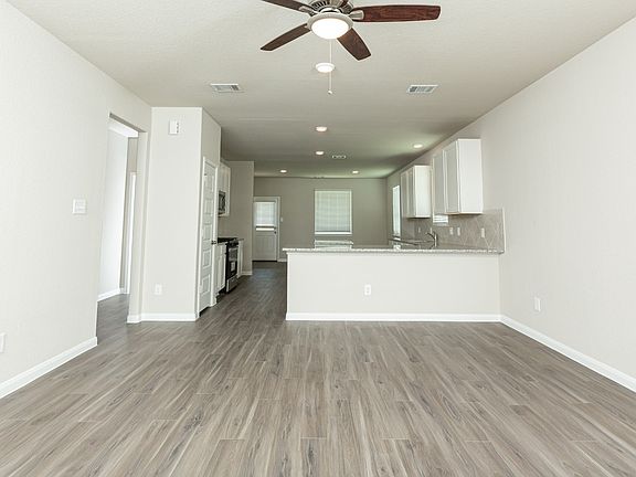 Family Room to Kitchen and Dining Area