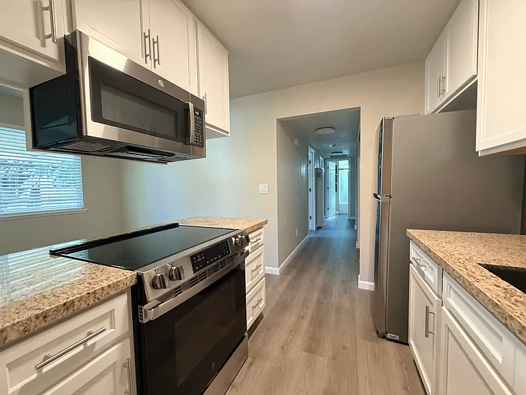 Kitchen looking down hallway.