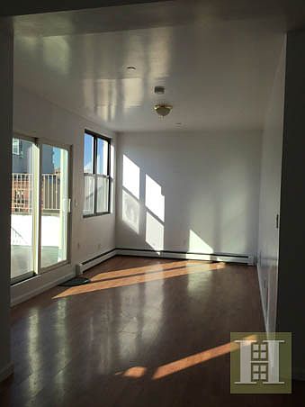1st image of 207-209 E 120th St