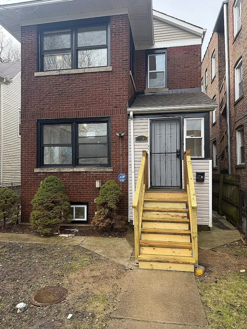 1311 E 71st Pl — Photo 1