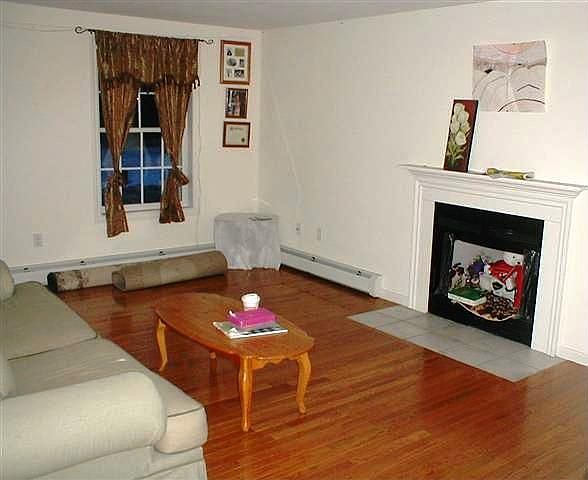 Living Room w/Hardwood & Fireplace