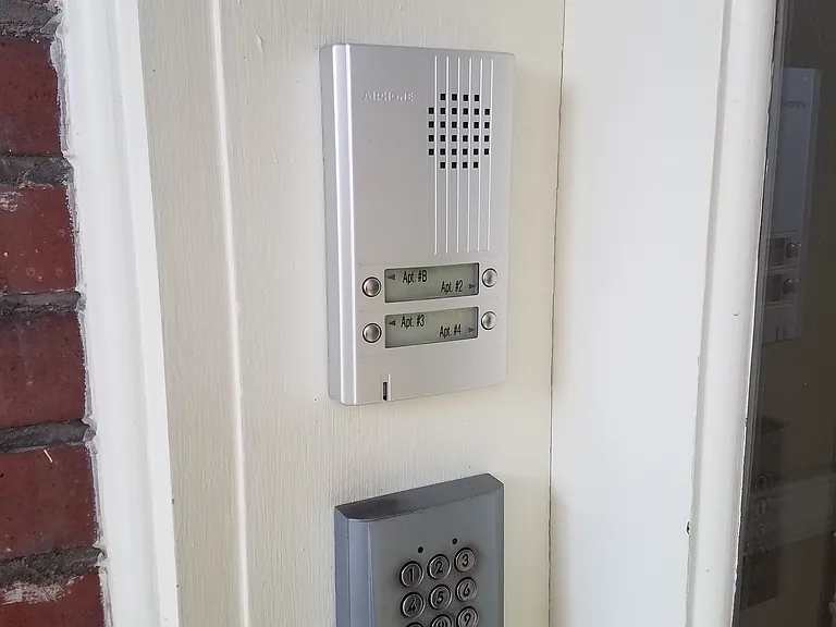 Intercom and door entry code at common hall entry door