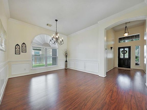 Lovely formal dining room, neutral, light and bright!