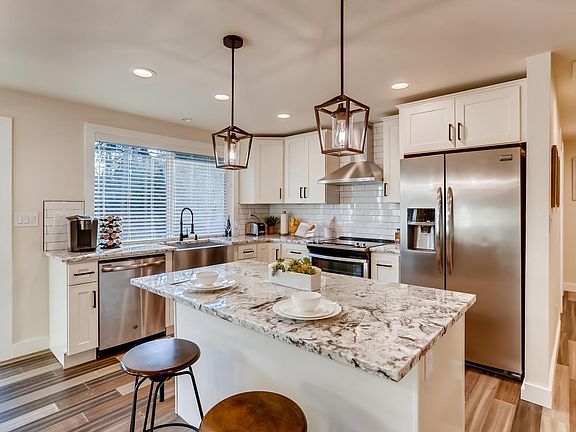 New Kitchen with Granite Counter top and Stainless Steel appliances