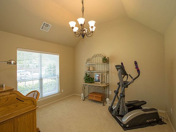 Vaulted formal dining or study off entry.