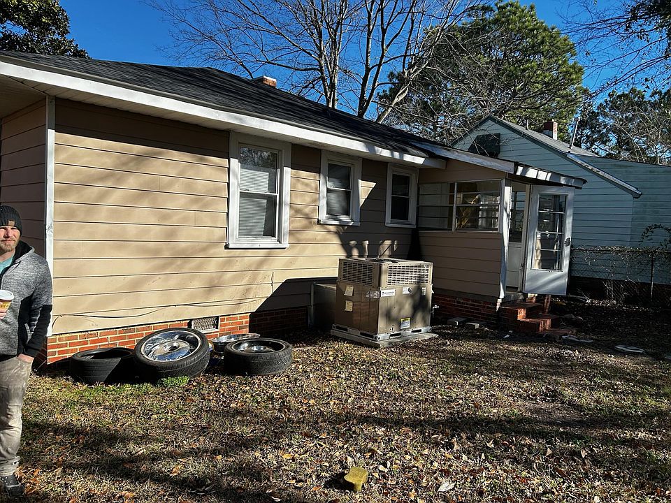 back of house. backyard fenced in