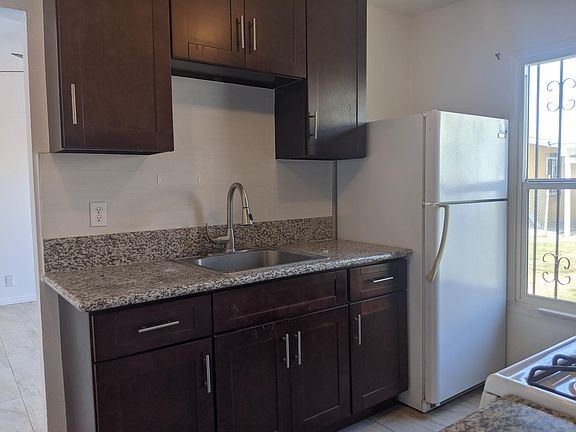 5th image of 3109 N Seaman Ave