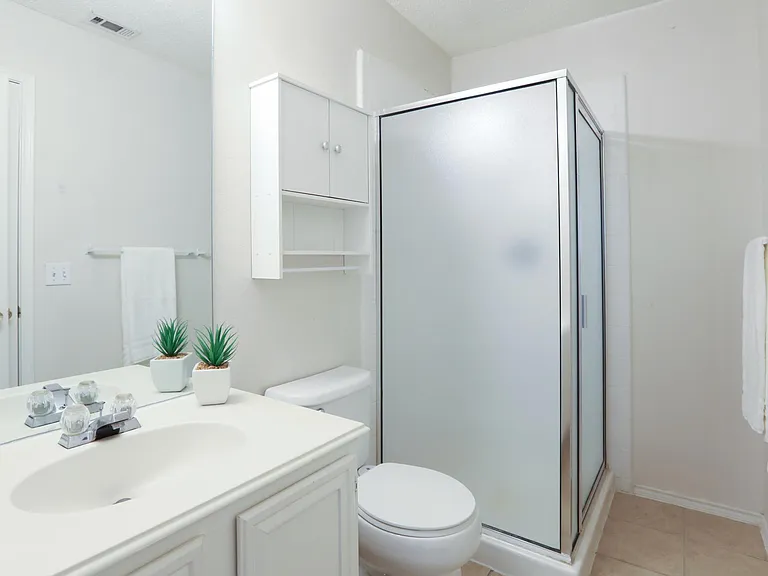Upstairs full bathroom attached to bedroom and the hall
