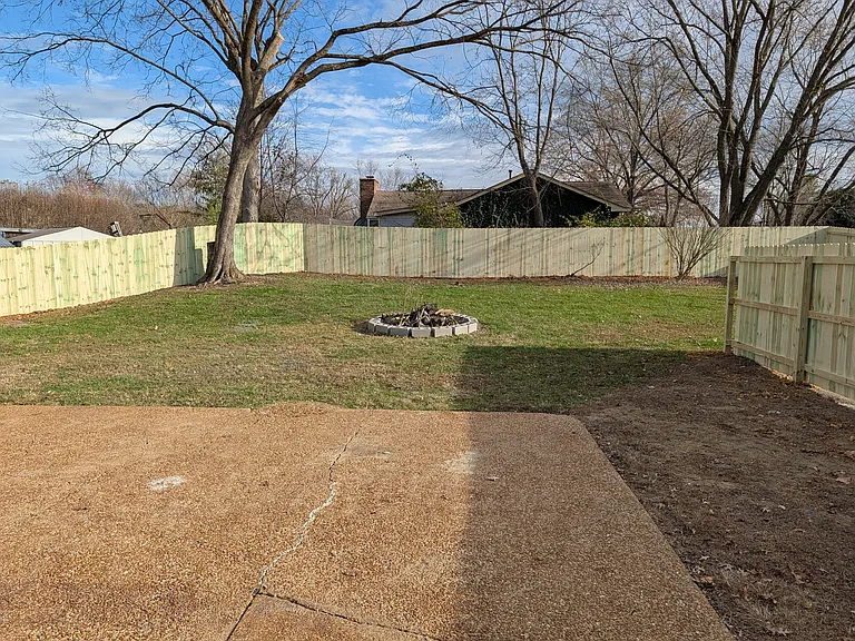 Newly fenced back yard. Perfect for kids!