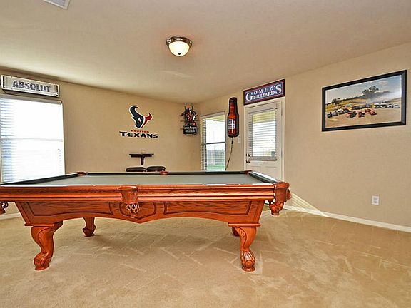 Living Room large enough to play a game of pool!