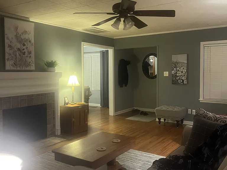 Living room _ warm and open to the entryway and dining area