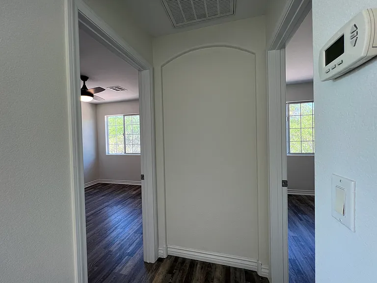 Upstairs to the left hand-side reside two bedrooms.