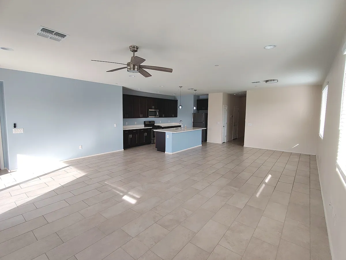 Open great room and kitchen - 7175 S Camino Del Cordero