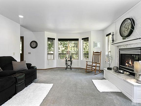 Another view of the living room looking out into the front yard.  