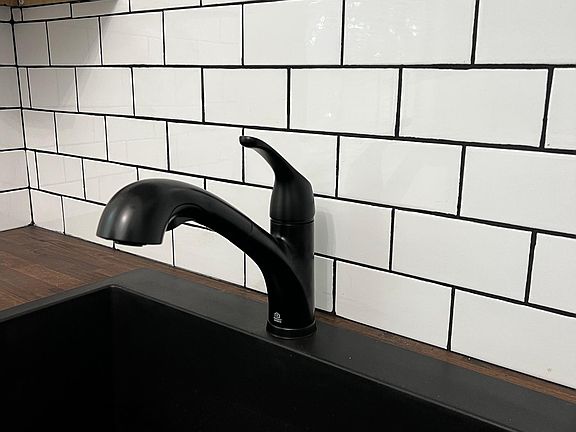 New Sink, back splash and faucet