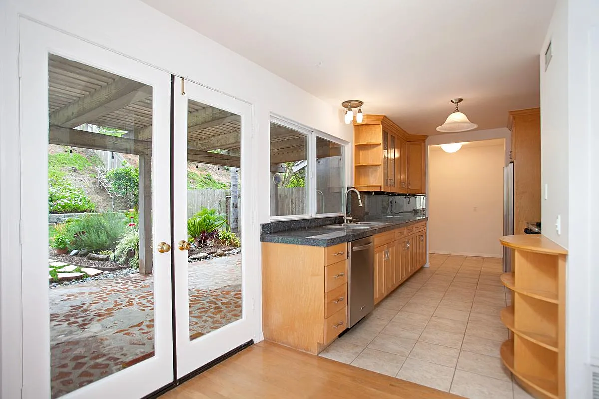French doors lead to covered patio. - Lower Lake Ct