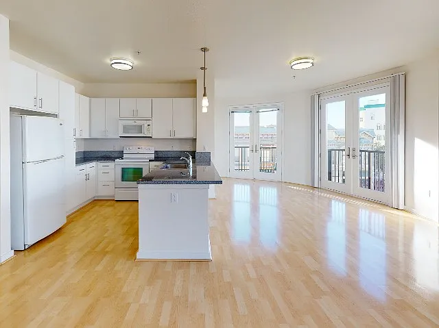 Floor to ceiling windows flood this home with natural light