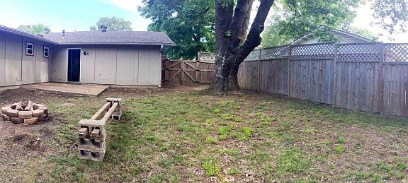 Backyard with 8 ft privacy fencing