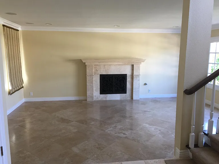 Living room with stone fireplace