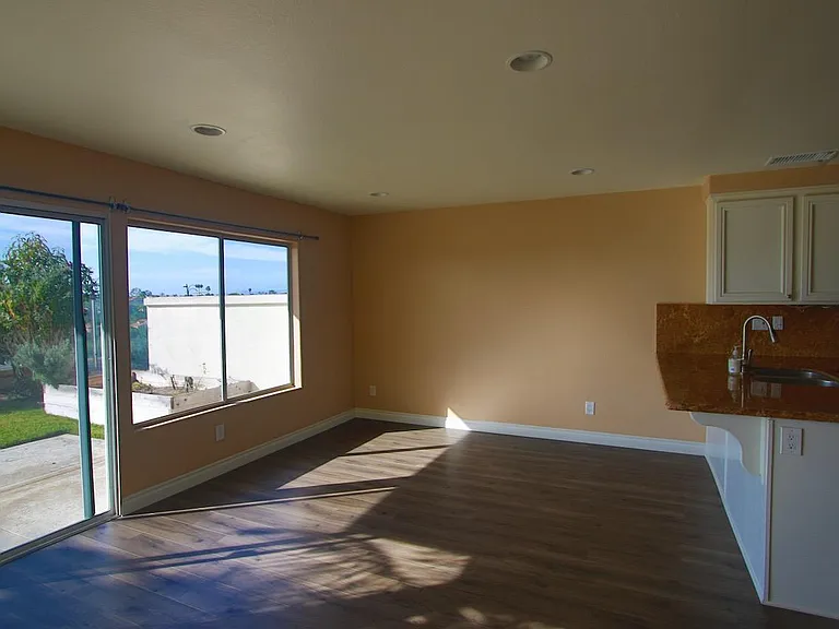 Family room adjacent to dining room and kitchen