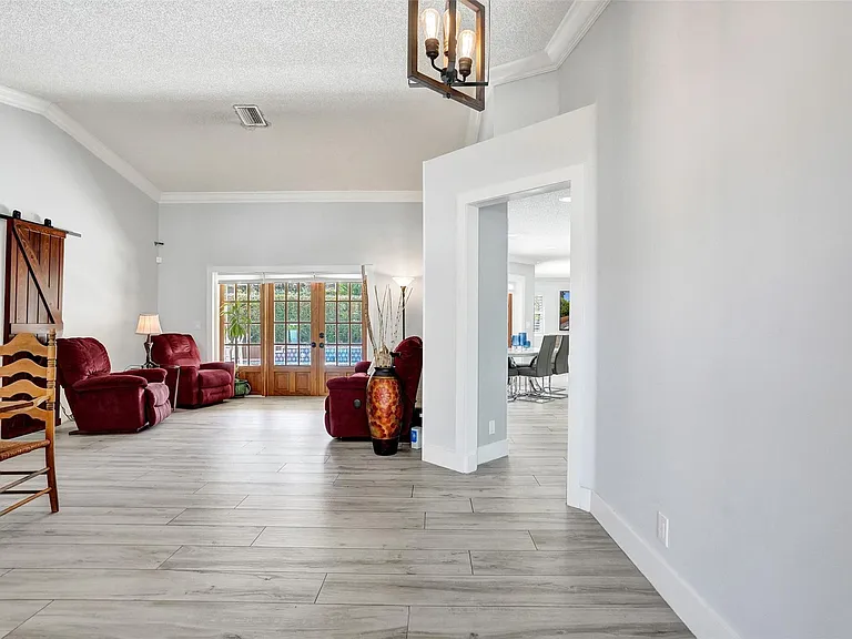 4142 NW 58th Dr — Photo 7