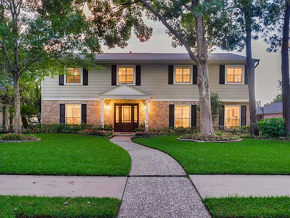 This lovely home is situated on a quite street in the Energy Corridor. The mature trees along with extensive landscaping make a perfect first impression.