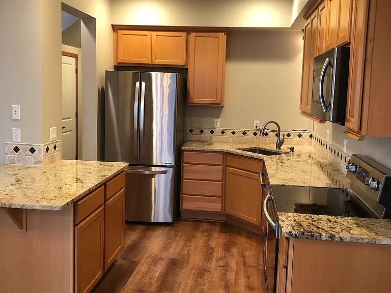 Kitchen with top-of-the-line appliances and granite countertops.