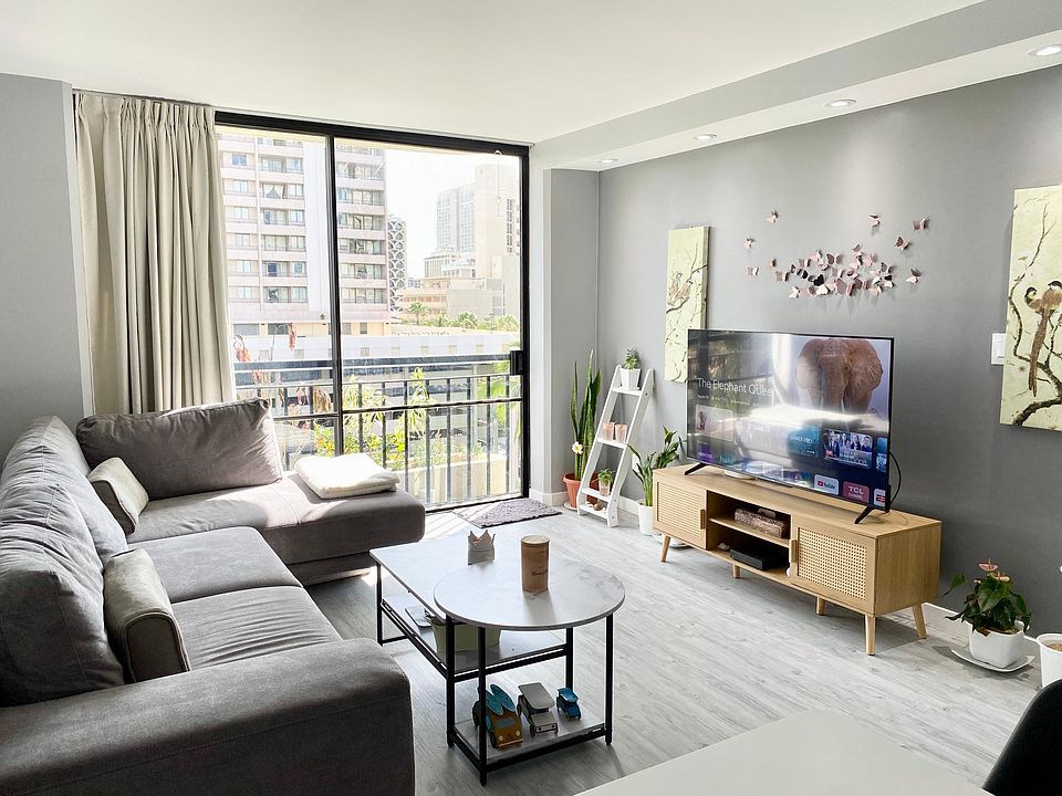 Spacious Living room with big sliding door. The whole living room feel like a lanai if you open the window