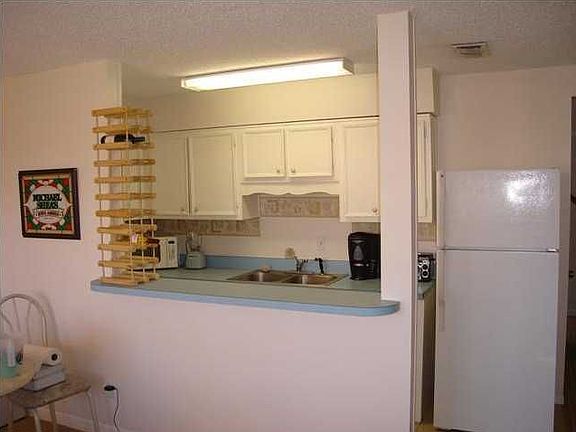 View of kitchen from living room