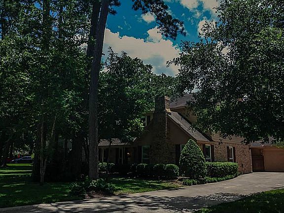 2 car garage is in back of house which allows for more driveway and parking space.