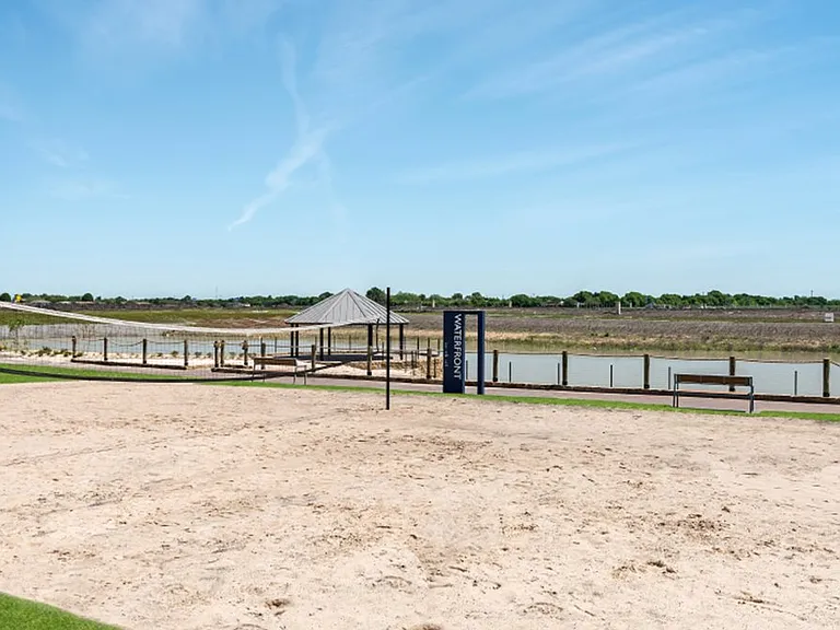Sand volley ball court by the Club-house, trails and stocked ponds.