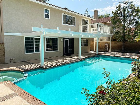 Backyard with pool and spa