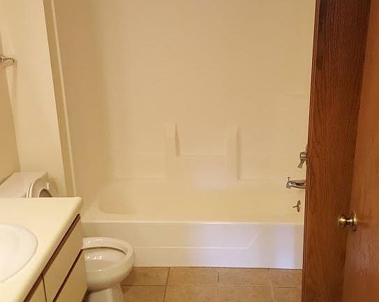 Bathroom with large linen closet