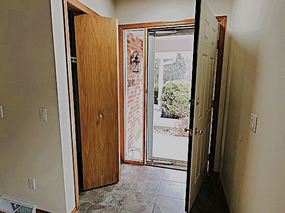 You'll find a spacious coat closet right when you walk in through the front door.