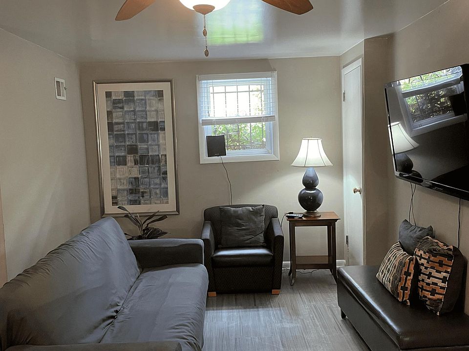 Large living room with high ceilings throughout.