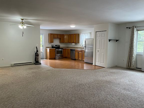 view of open area with kitchen