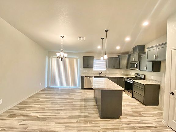 4th image of 11553 E 33rd Ln