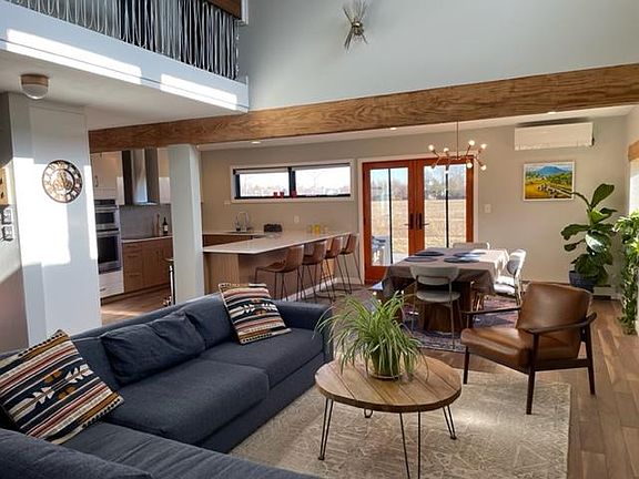 Living room, dining area, kitchen (open floor plan)
