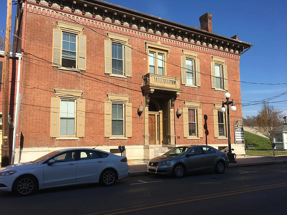 Front view of the building with levee behind.