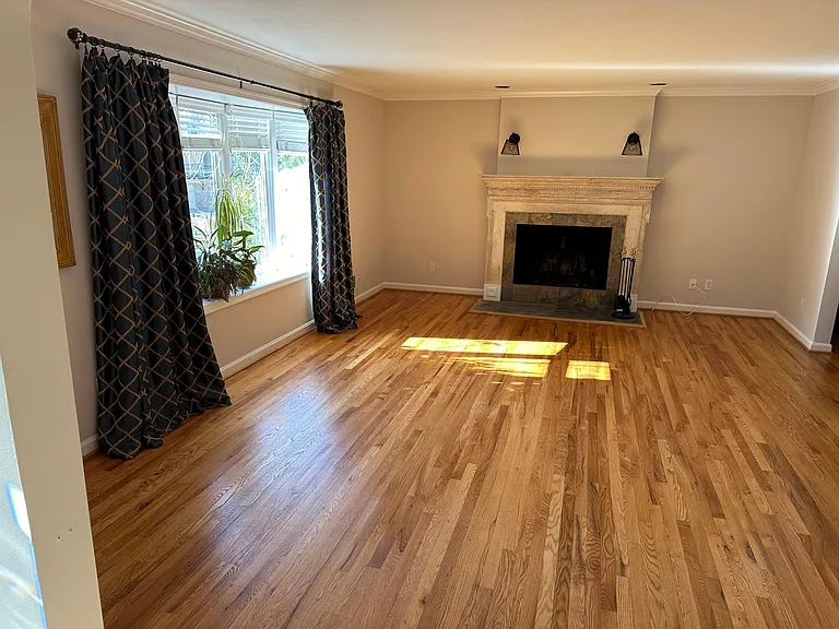 Living Room with Wood-Burning Fireplace