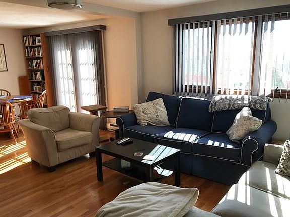 Large living room space gets plenty of daylight sun.