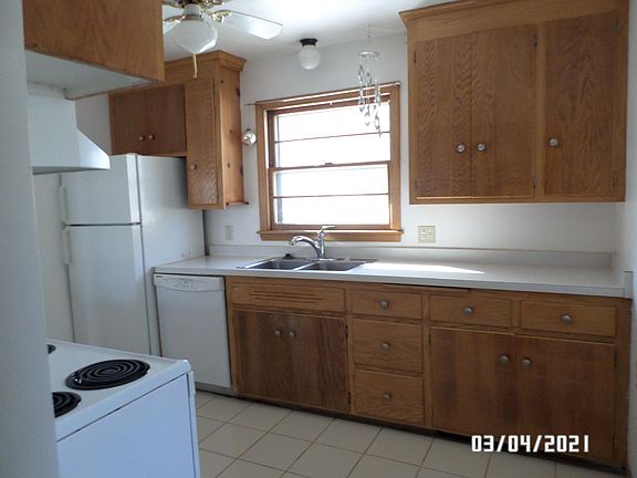 Kitchen, west facing window overlooking the street.