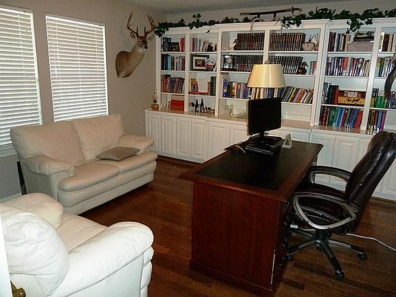 The study has lots of built-ins and is the perfect space to work from home.