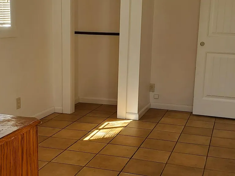 room #1 with a private outdoor entrance to the back yard.
Closet space
