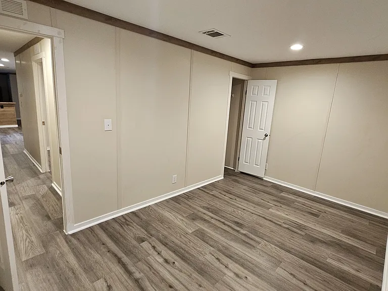 Bedroom #2 with closet in the corner.