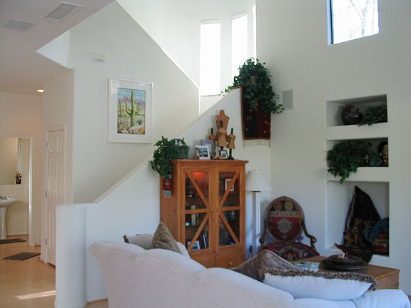 Pretty architectural detail with 26 ft ceiling, clerestory windows, art niches