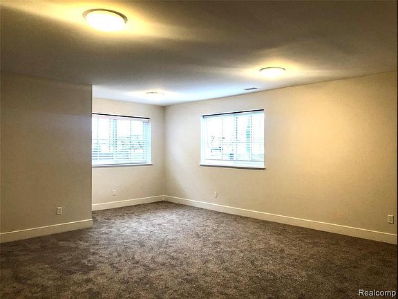 2ndary gathering room with 8 1/2' ceiling & adjacent to full bath & storage closet